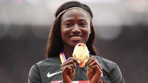 Tori Bowie poses with the gold medal for the Women's 100 meters at IAAF World Athletics Championships London 2017