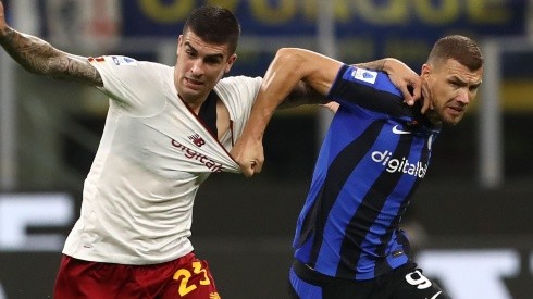 Gianluca Mancini of Roma and Edin Dzeko of Inter