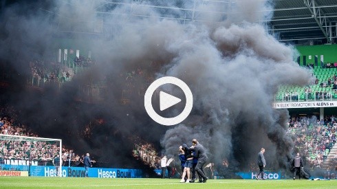 GRONINGEN - Supporter storms the field during the Dutch premier league match between FC Groningen and Ajax at the Eurobo