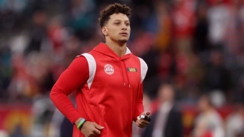 Patrick Mahomes looks on during his warm up to a game.
