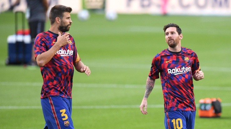 Piqué y Messi en un entrenamiento de Barcelona.