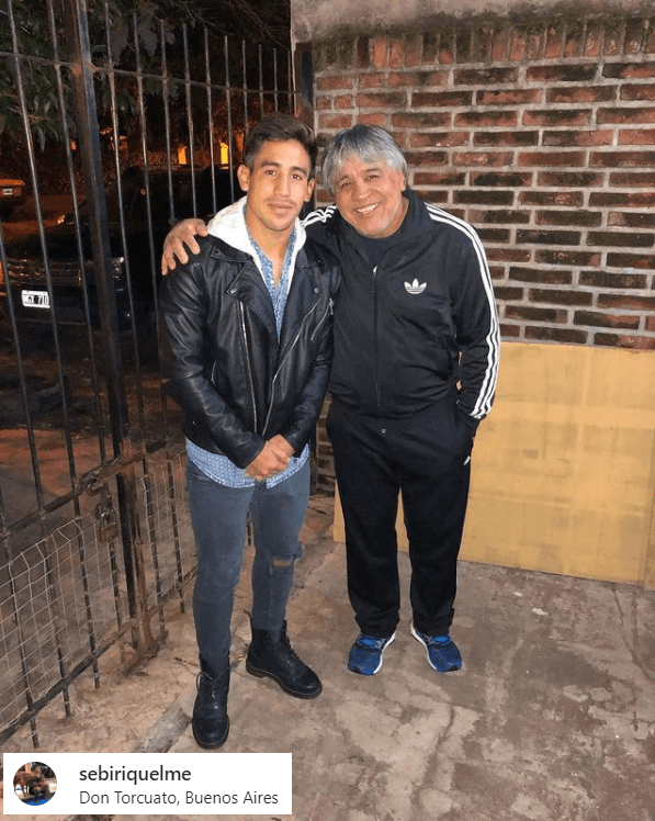 Cacho con Sebastián Riquelme, hermano de Román