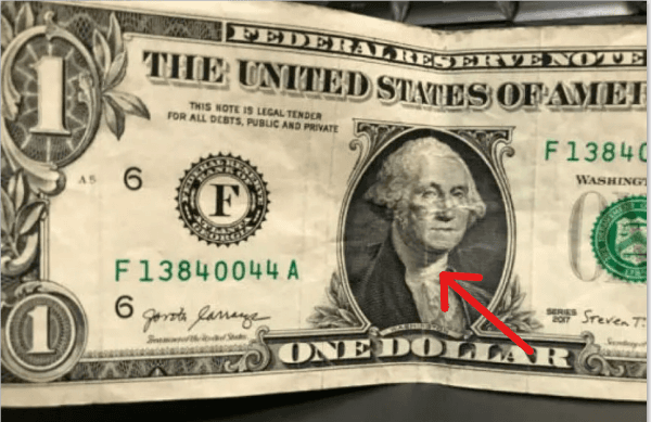 El error de impresión que generó líneas verticales en el billete de 1 dólar.