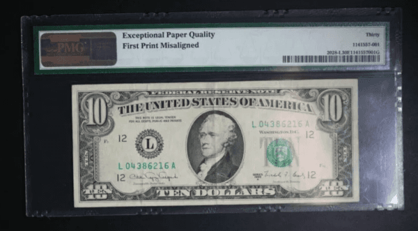 El frente del billete de 10 dólares con un error de impresión.