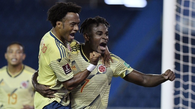 Colombia's Duvan Zapata (right) celebrates with teammate Juan Cuadrado (Getty).