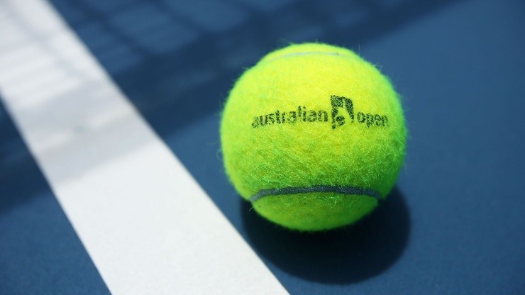An Australian Open branded tennis ball is seen on court. (Getty)