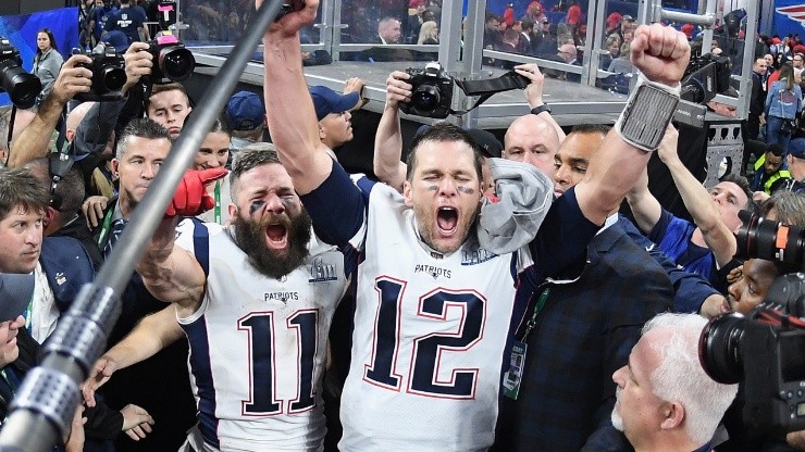 Julian Edelman (left) of the New England Patriots and teammate Tom Brady (right) celebrate at the end of the Super Bowl 2019. (Getty)