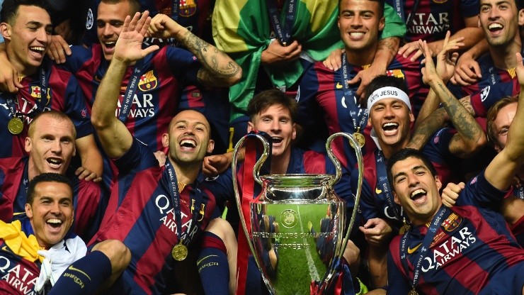Barcelona players including Javier Mascherano, Lionel Messi, Neymar and Luis Suarez celebrate victory with the trophy after the UEFA Champions League Final between Juventus and FC Barcelona (Getty Images).