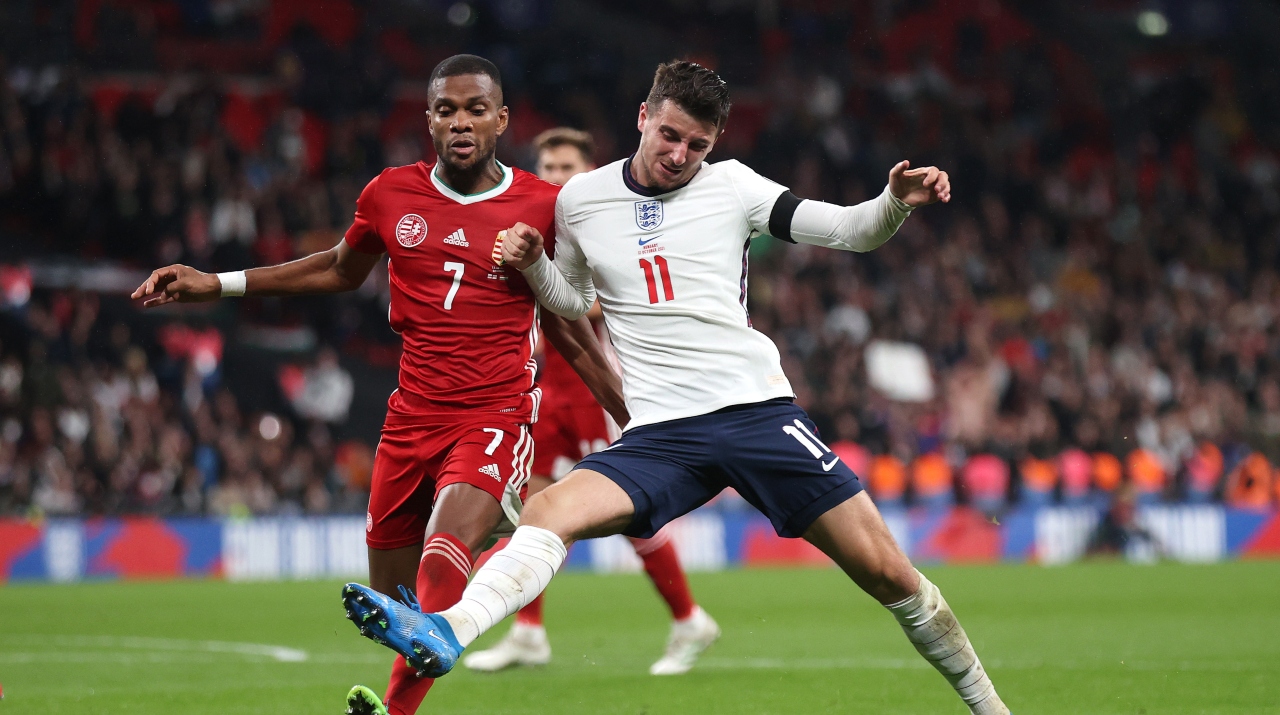 Mason Mount of England battles for possession with Loic Nego of Hungary