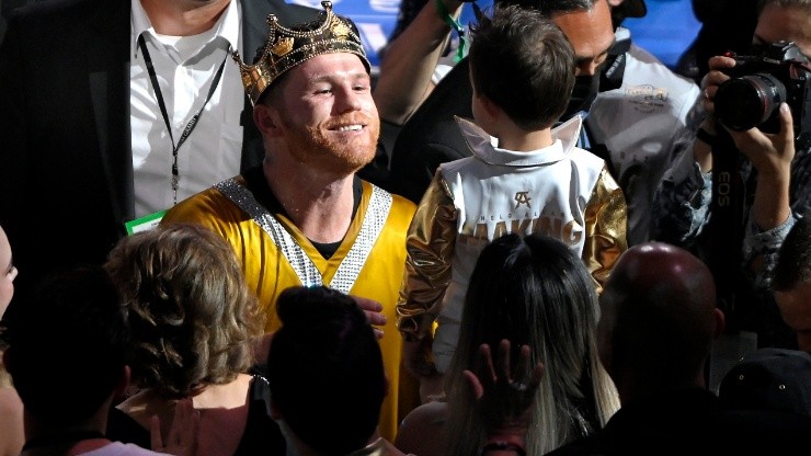 Canelo Alvarez celebrates his Unified World Super middleweight Championship with his son
