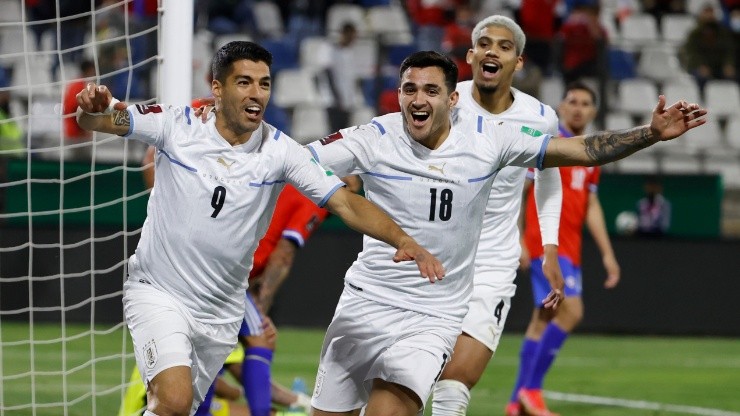 Luis Suarez celebrates his goal against Chile