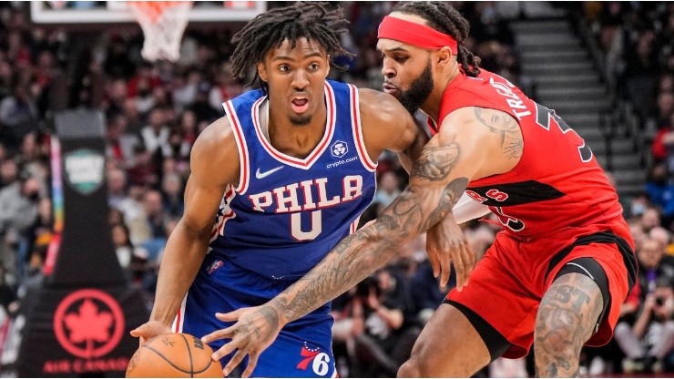 Tyrese Maxey of the Philadelphia 76ers drives against Gary Trent Jr. of the Toronto Raptors