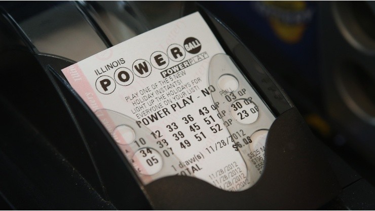 A Powerball lottery ticket is printed for a customer at a convenience store