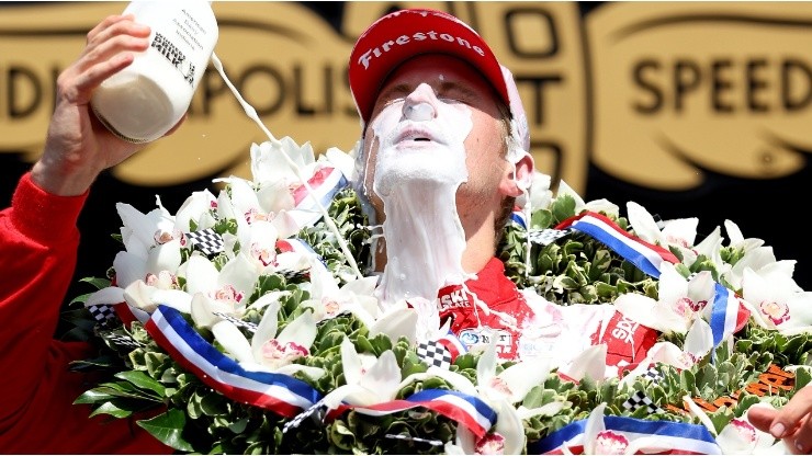Marcus Ericsson does the traditional Indy 500 celebration