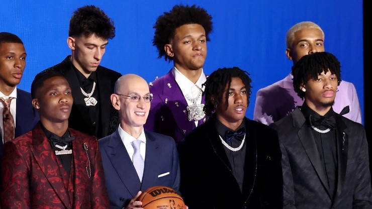 NBA commissioner Adam Silver (C) with the 2022 NBA Draft class