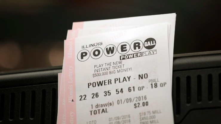 Powerball tickets rest on a convenience store register