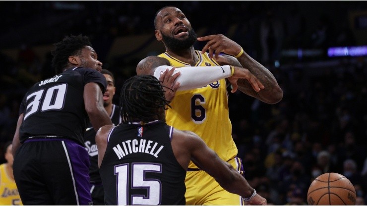 LeBron James of the Los Angeles Lakers reacts as he is stripped of the ball by Davion Mitchell of the Sacramento Kings