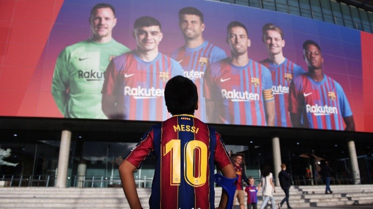 A Barcelona fan with a Lionel Messi printed shirt