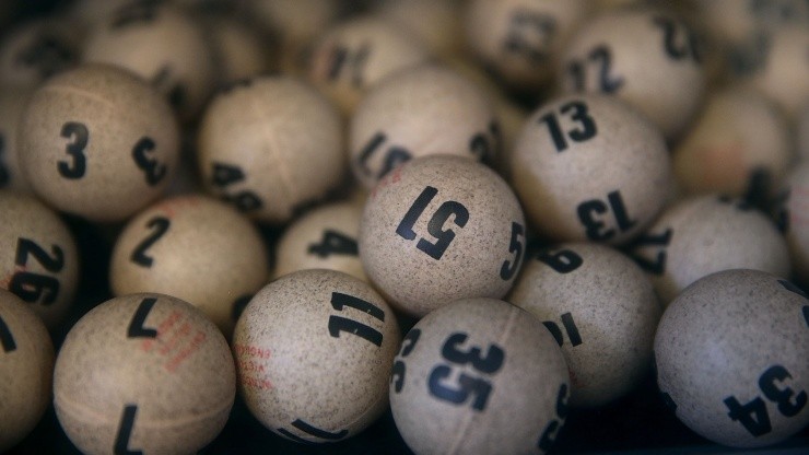 Powerball Lottery ball-numbers are seen in a box at a convenience store