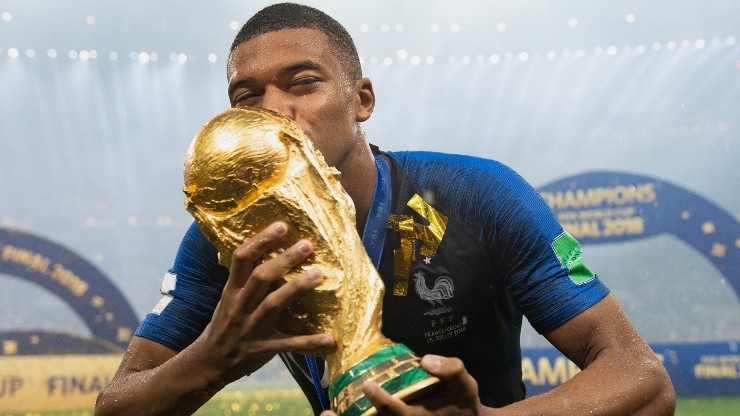 Kylian Mbappe of France celebrates with the World Cup Trophy