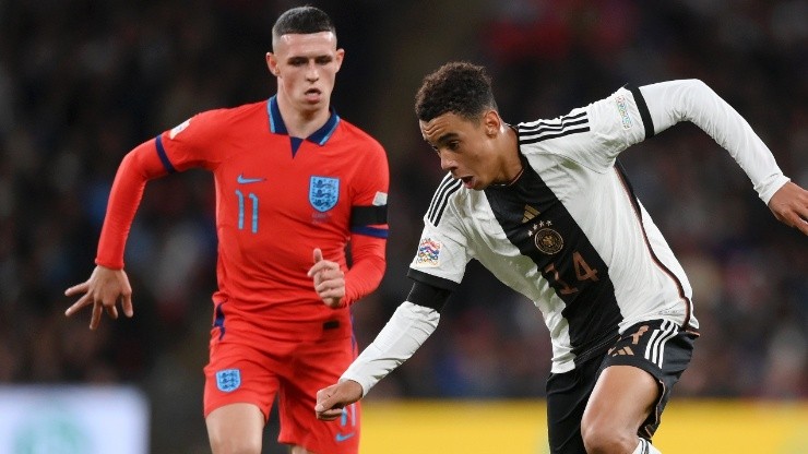 Jamal Musiala of Germany and Phil Foden of England