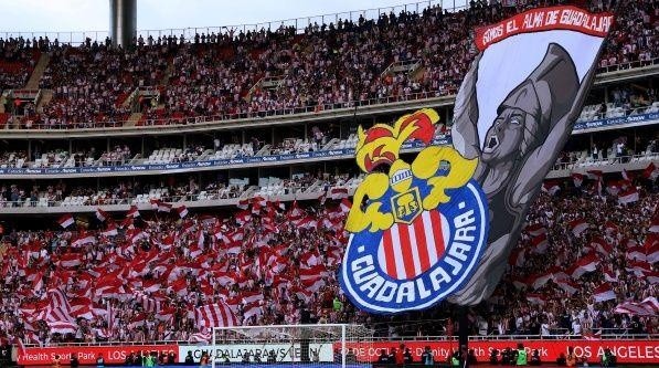 Chivas fans supporting their team during a game.