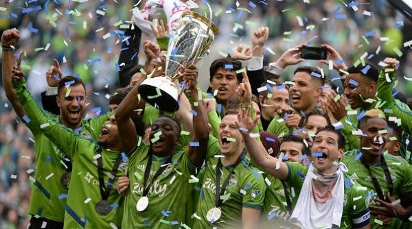 The Sounders celebrate after winning the MLS Cup.
