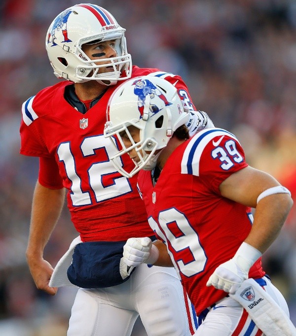 Brady junto a Woodhead 