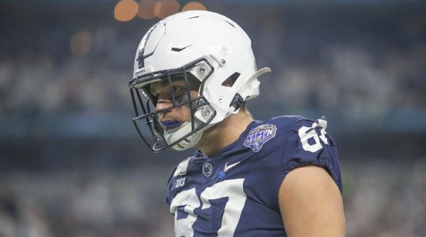 He played tight end and linebacker in high school (Getty)