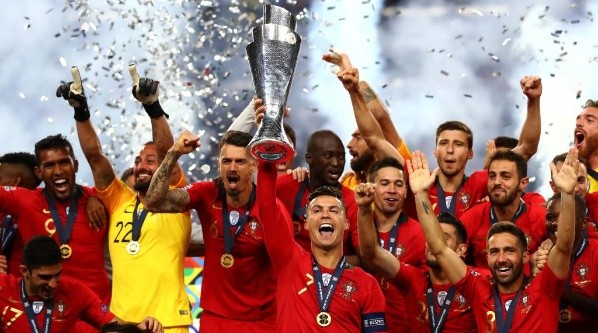Cristiano lifting the UEFA Nations League trophy.