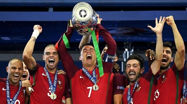.Cristiano winning the European championship with Portugal.