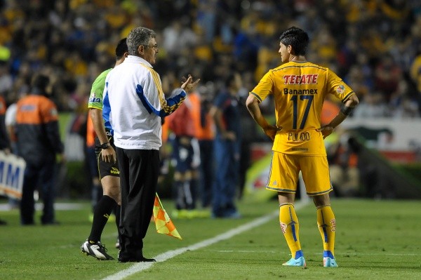 Pulido recibe indicaciones de Ferretti en el Clausura 2014.