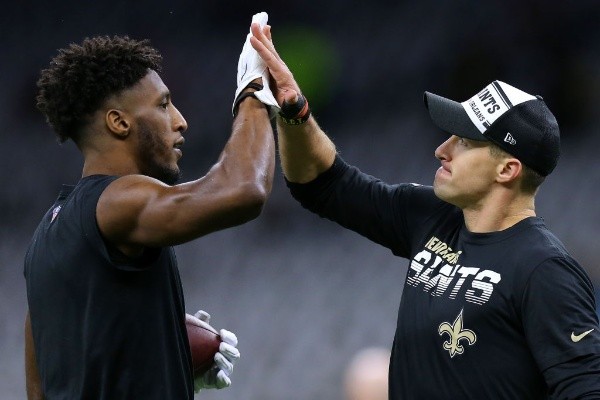 Michael Thomas y Drew Brees.
