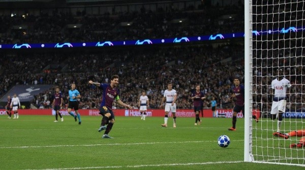 Messi scoring from the penalty spot against Tottenham (Getty).