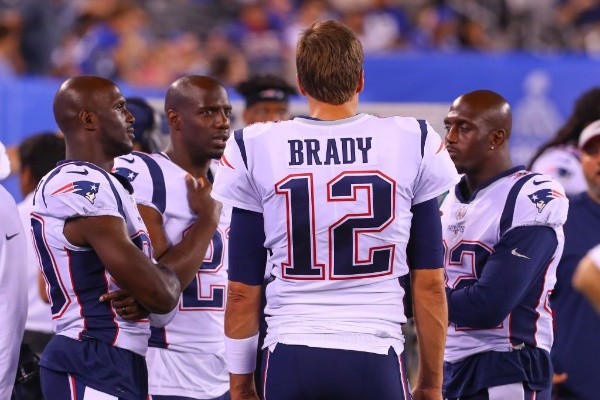 Brady junto a los gemelos McCourty (Getty Images)