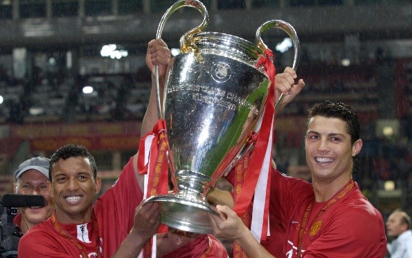 Nani and Cristiano Ronaldo hold the Champions League trophy (Getty).
