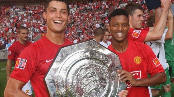 Cristiano Ronaldo and Nani celebrate with the Community Shield trophy (Getty).