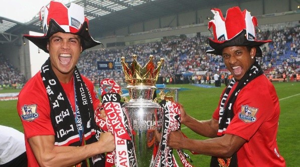 Cristiano Ronaldo and Nani of Manchester United celebrate with the Premier League trophy (Getty).