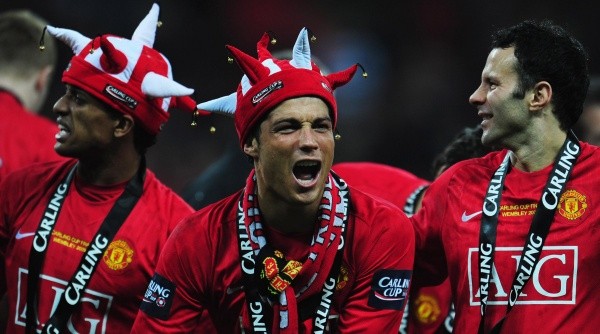 Nani, Cristiano Ronaldo and Ryan Giggs of Manchester United celebrate after winning the League Cup (Getty).