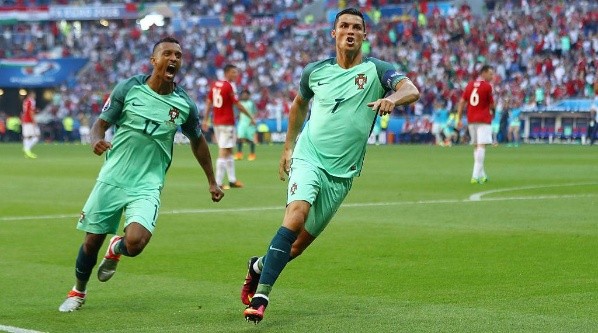 Cristiano Ronaldo of Portugal celebrates with his teammate Nani after scoring a goal (Getty).