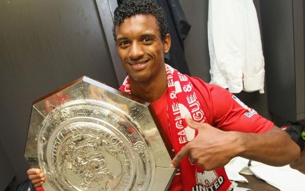 Nani poses with the Community Shield trophy (Getty).