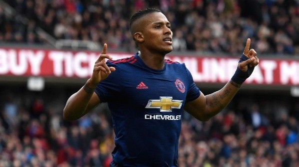 Antonio Valencia celebrates after scoring a goal for Manchester United (Getty).