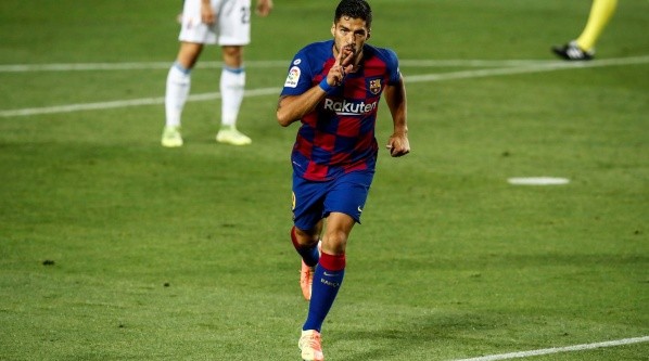 Barcelona’s Luis Suárez celebrates after scoring a goal (Getty).