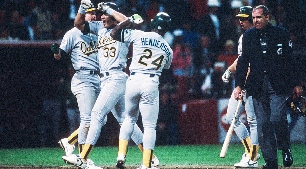 José Canseco &amp; Rickey Henderson in the World Series. (Getty)