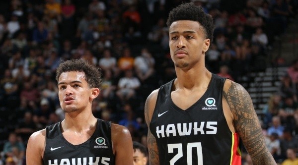 Trae Young &amp; John Collins. (Getty)