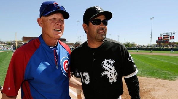 Mike Quade (Cubs) & Ozzie Guillén (White Sox). (Getty)