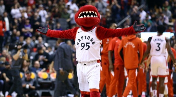 He’s a dunking velociraptor. (Getty)