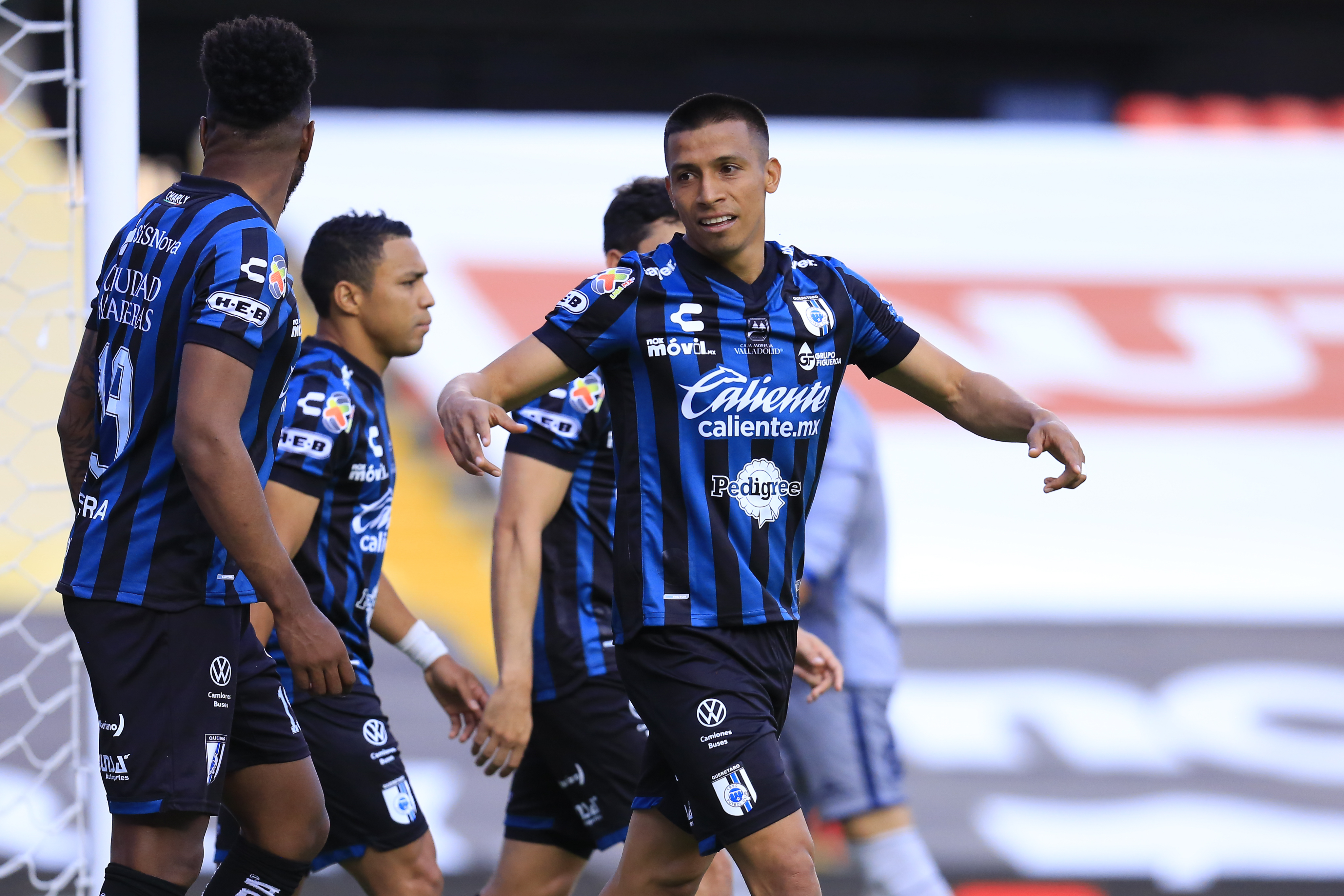 Jugadores de Querétaro celebran ante Atlético San Luis. Foto: Imago 7