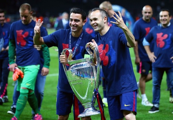 Xavi Hernández y Andrés Iniesta
