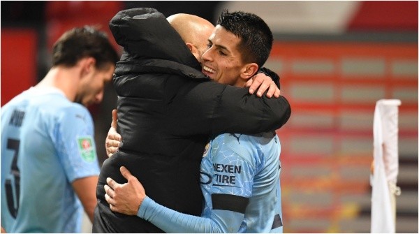 Ferran Torres, abrazado por Pep Guardiola (Getty)